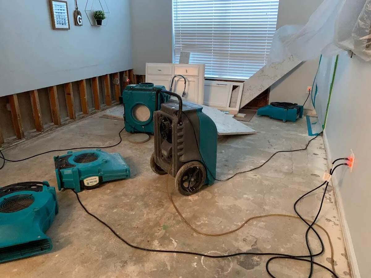 Dehumidifier in flood-cut room for Water Damage Restoration in Doral